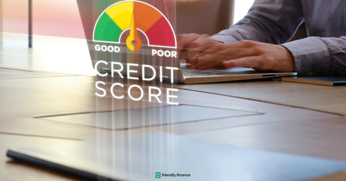 A person types on a laptop keyboard with a graphic overlay of a credit score gauge ranging from red to green, illustrating credit history monitoring.