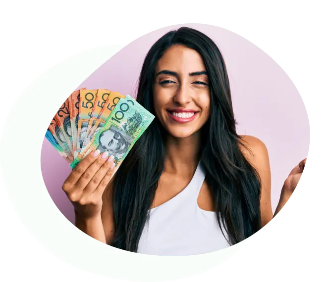 Smiling woman holding a fan of Australian banknotes
